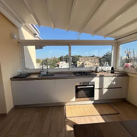 Attico Panoramico Whitecate Appartement